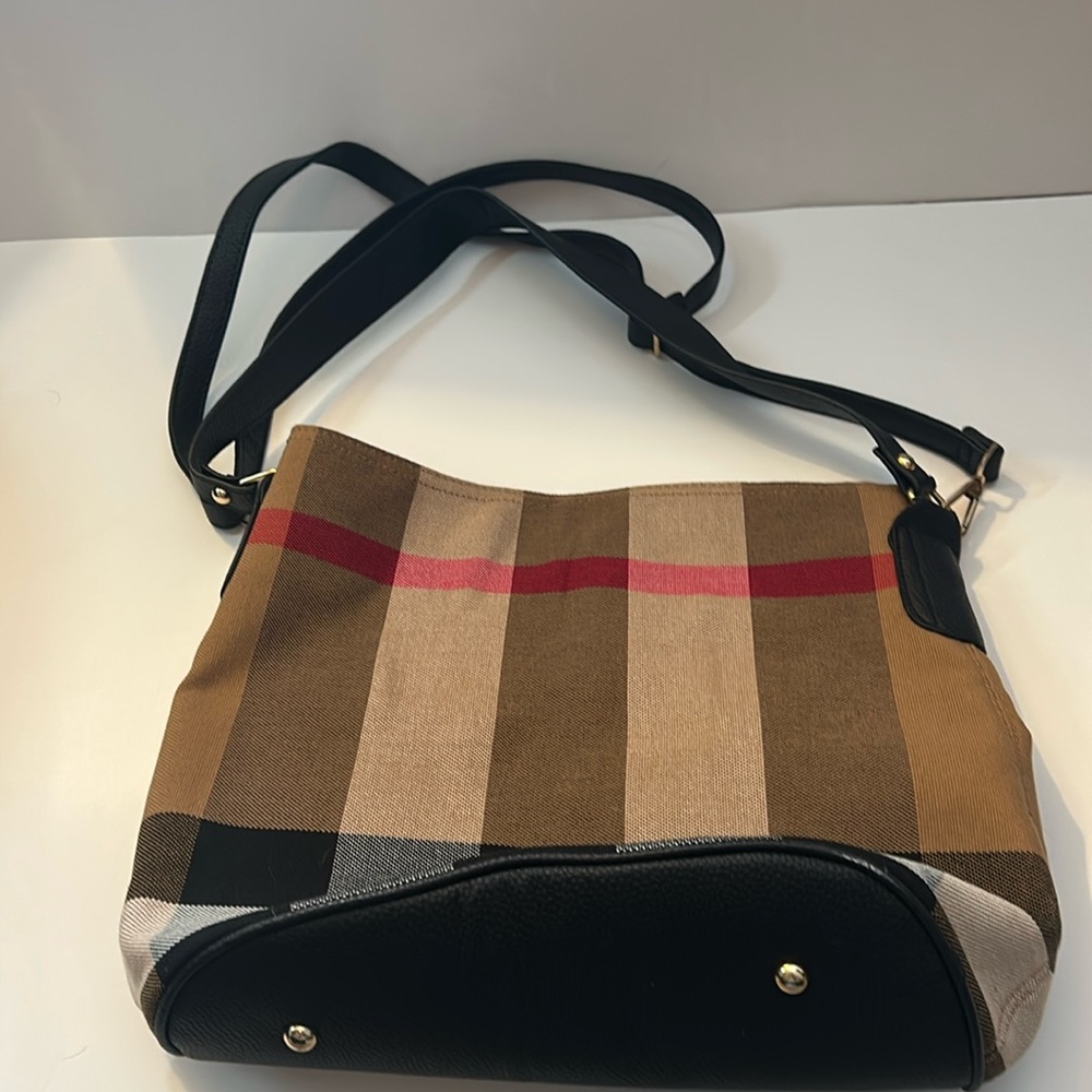 Jothin luxury-inspired bucket bag. Used one time. Two straps included.